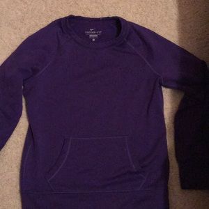 A purple therma fit Nike crew neck